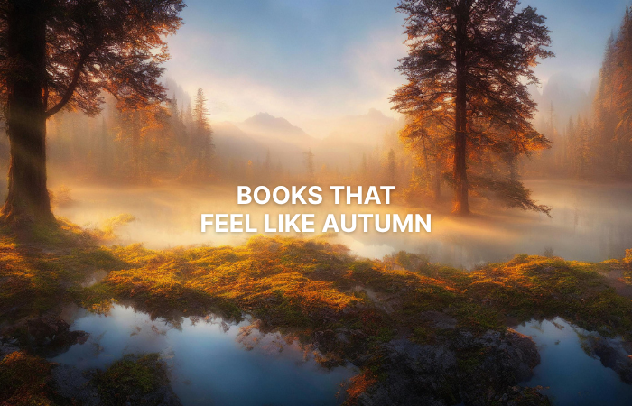 books that feel like autumn with autumn trees in the background and mist over a lake